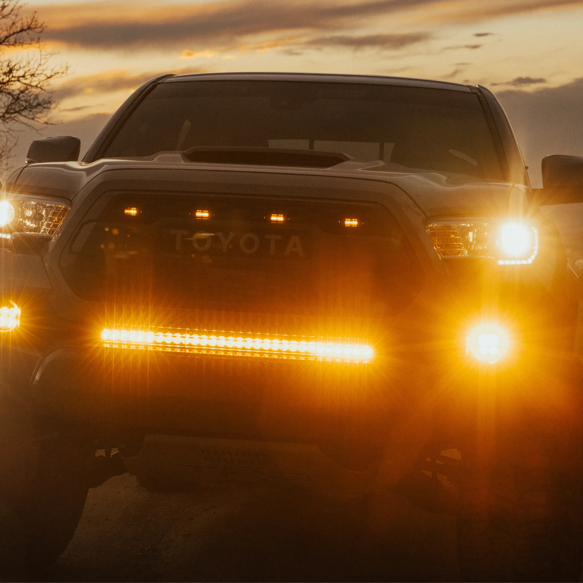 Heretic Studio Toyota Tacoma - Behind The Grille - 30 Inch Light Bar - Amber Lens
